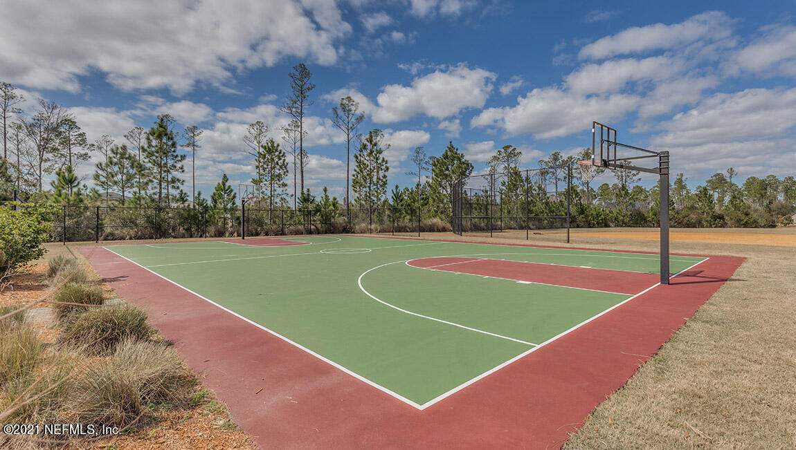65776 Edgewater Drive Yulee, FL 32097 - Photo 27 of 45 a view of a tennis court