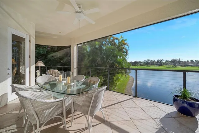a outdoor view with a hardwood floor and lake view