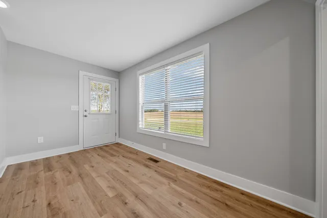 an empty room with windows