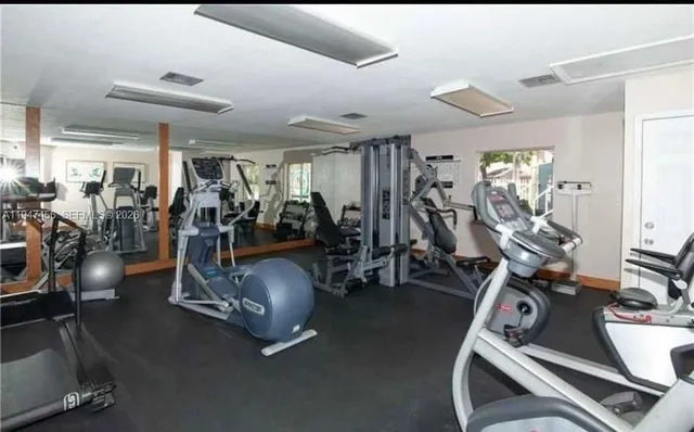 a view of a lake with houses in the back