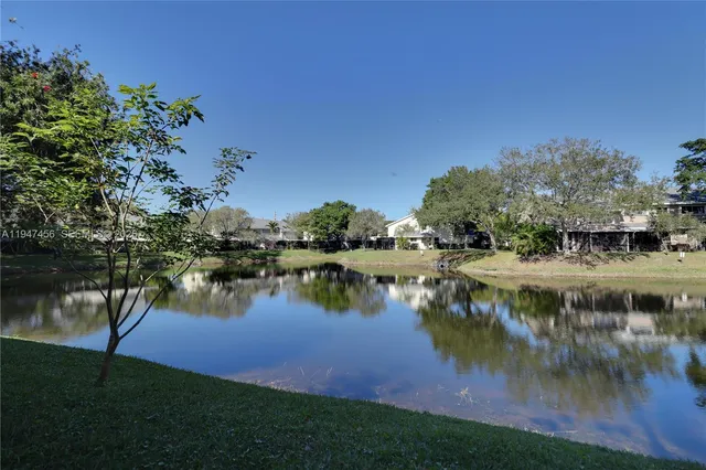 a view of a livingroom with furniture and window