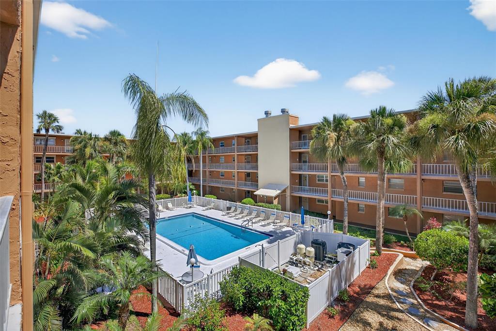 12760 Indian Rocks Road, Unit 571 Largo, FL 33774 - Photo 30 of 39 a view of an house with backyard and patio