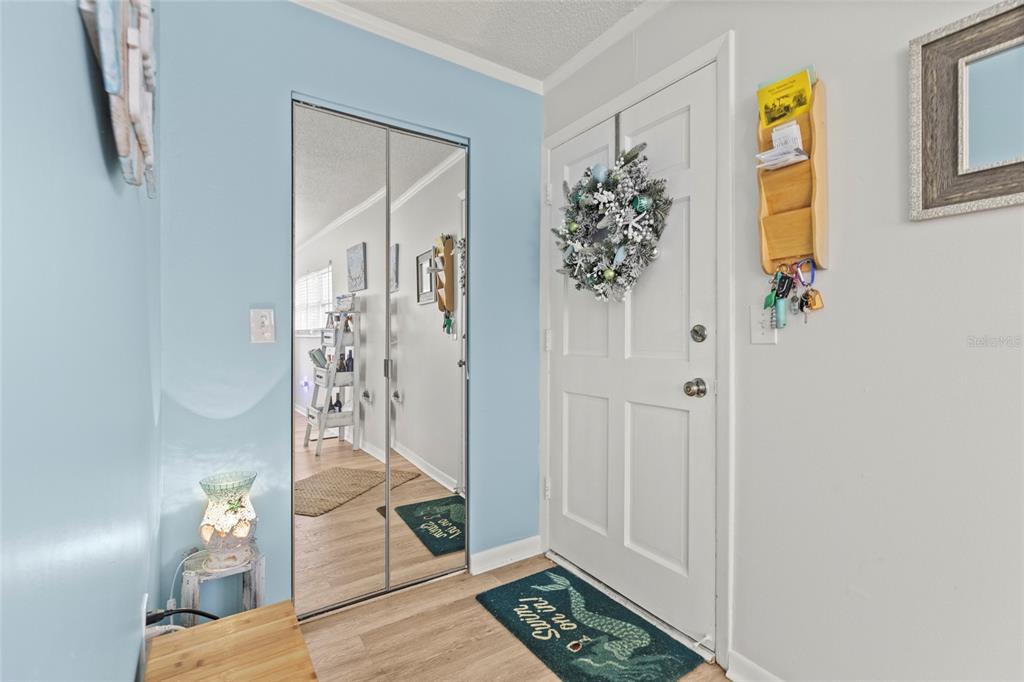 12760 Indian Rocks Road, Unit 571 Largo, FL 33774 - Photo 8 of 39 a view of entryway with wooden floor