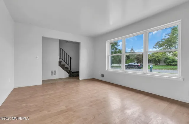 an empty room with windows