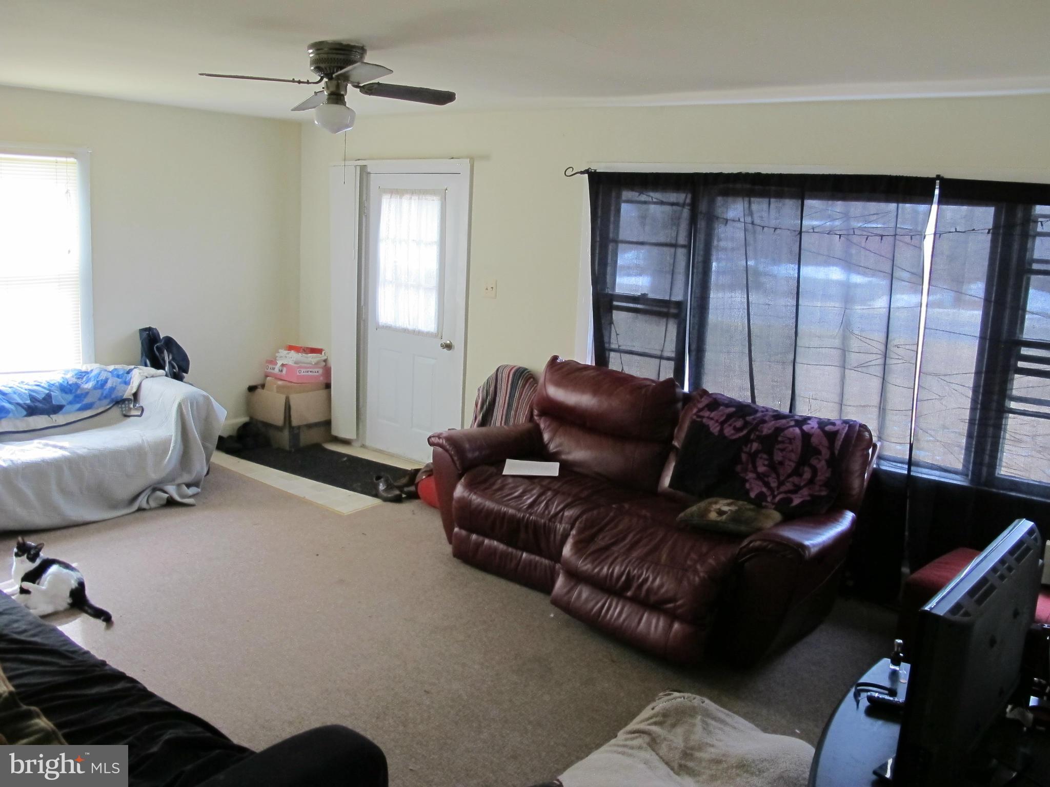 607 Waterloo Road Warrenton, VA 20186 - Photo 11 of 16 a living room with furniture and a window