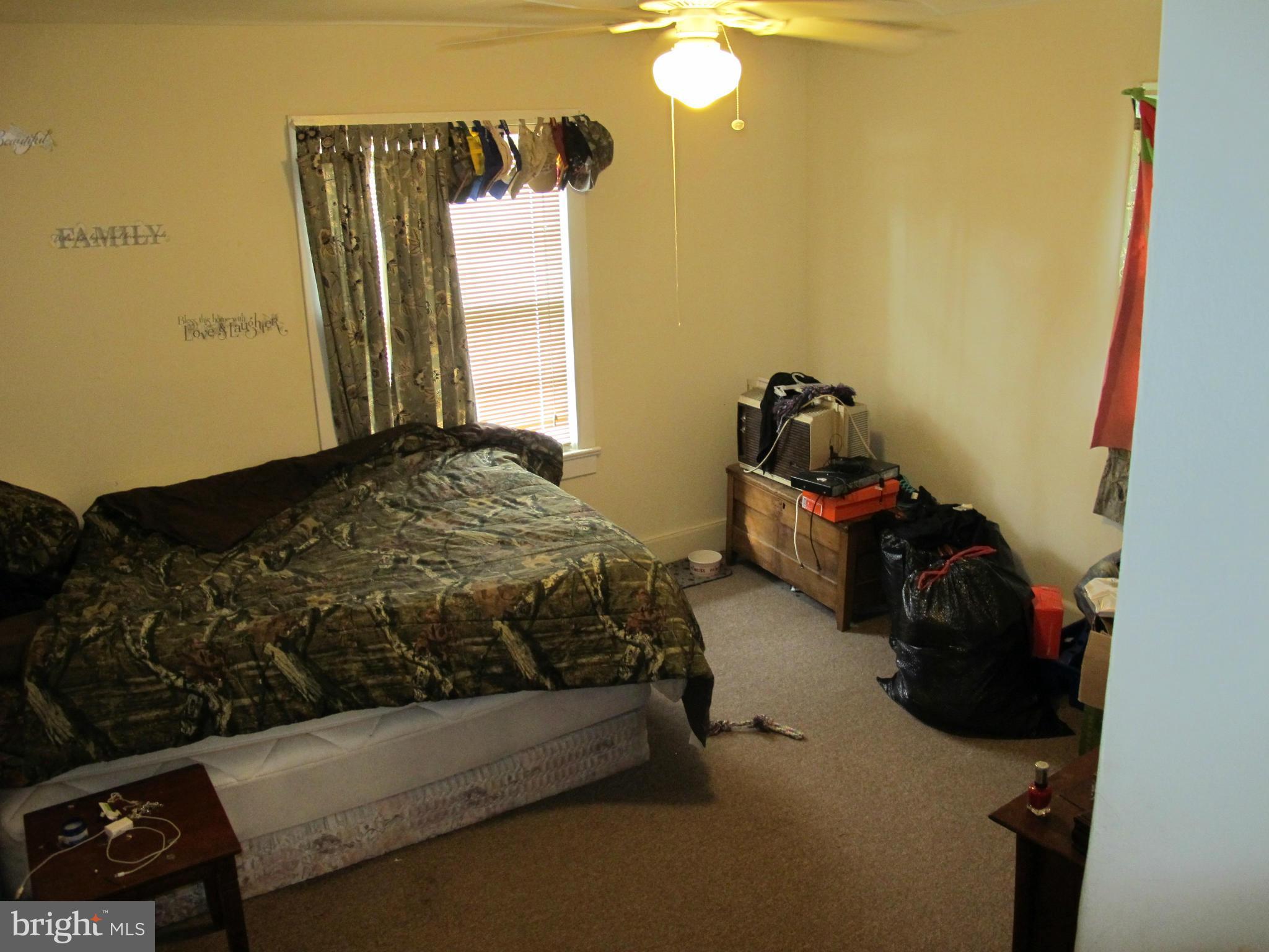 607 Waterloo Road Warrenton, VA 20186 - Photo 13 of 16 a bedroom with a bed and a window