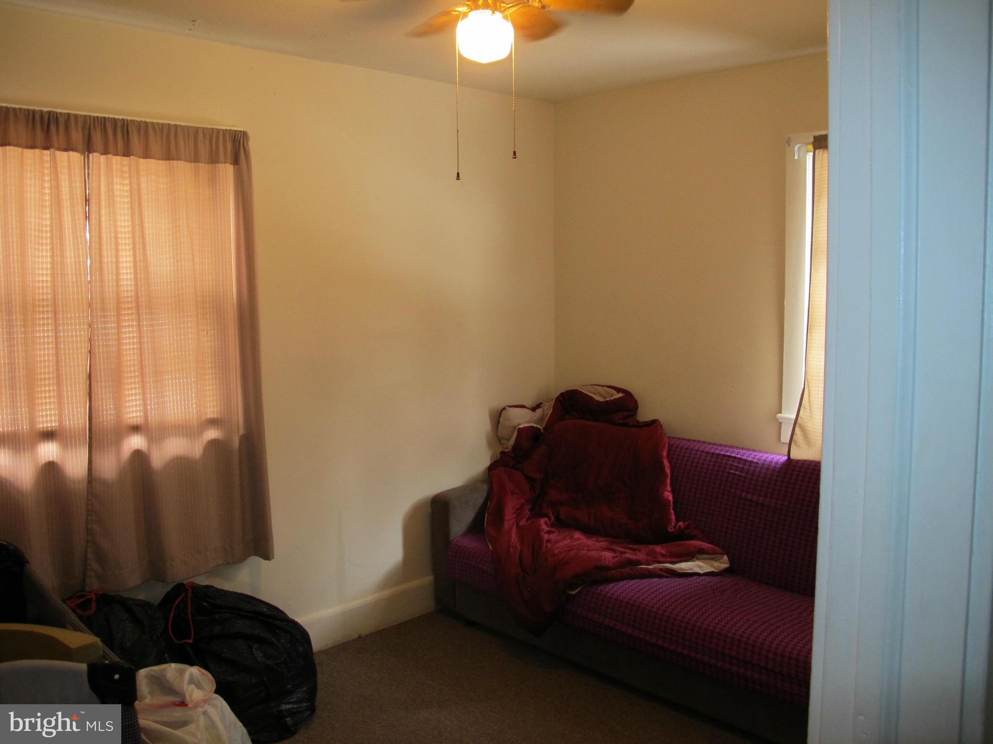 607 Waterloo Road Warrenton, VA 20186 - Photo 15 of 16 a living room with furniture and a window