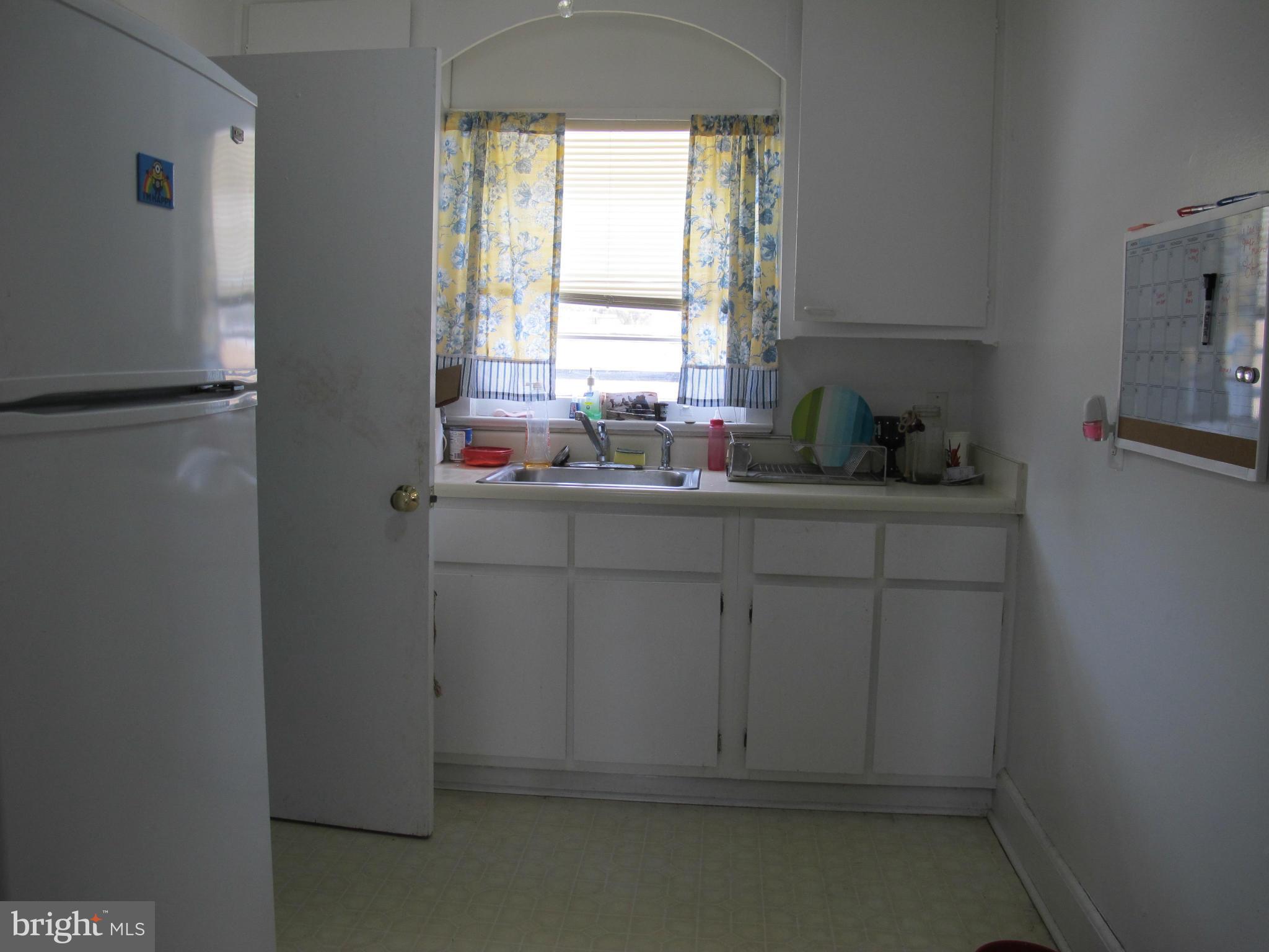 607 Waterloo Road Warrenton, VA 20186 - Photo 6 of 16 a bathroom with a sink toilet and window