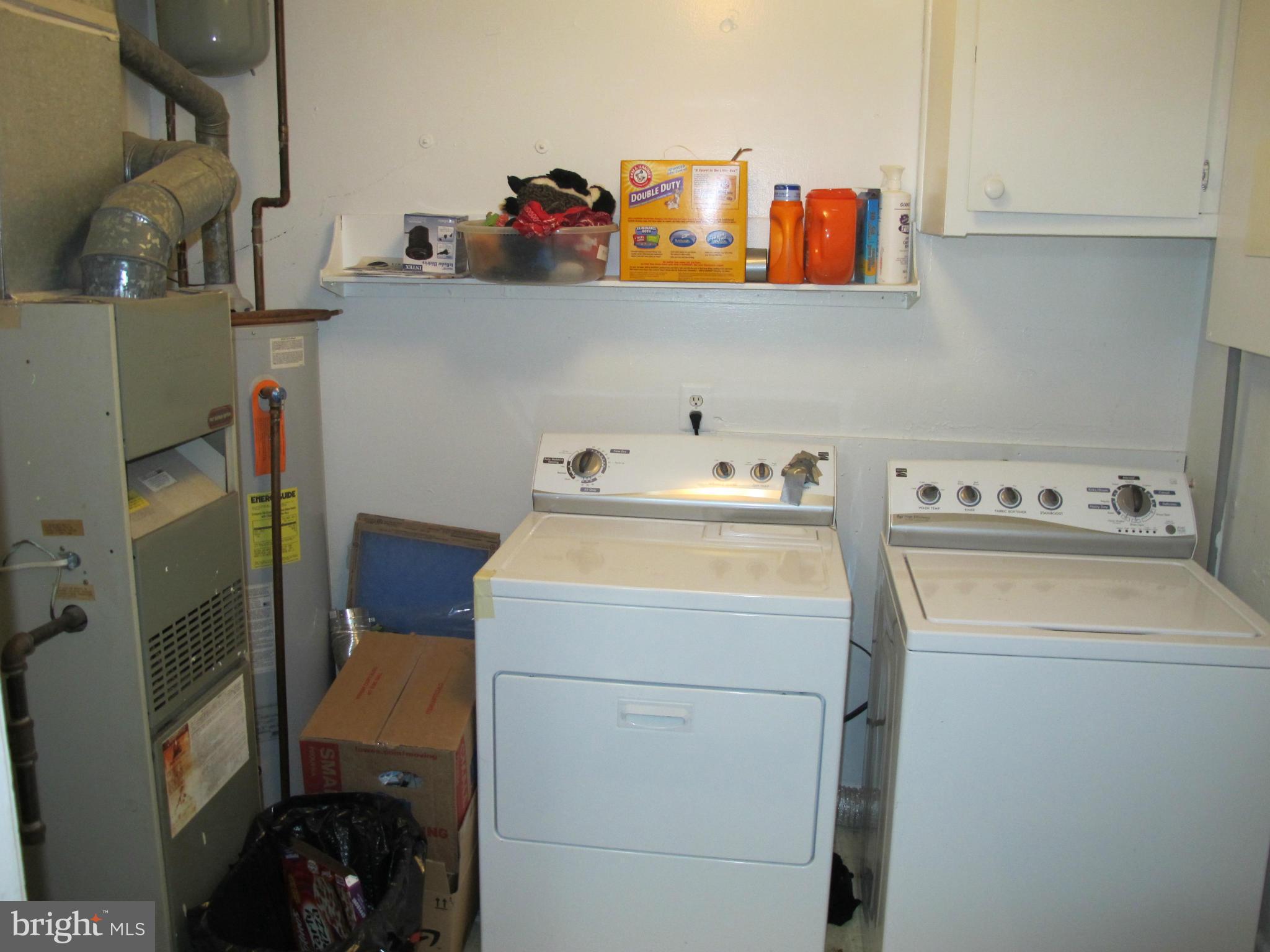 607 Waterloo Road Warrenton, VA 20186 - Photo 8 of 16 a utility room with dryer and washer