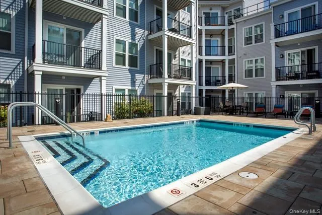 front view of an buildings with a swimming pool