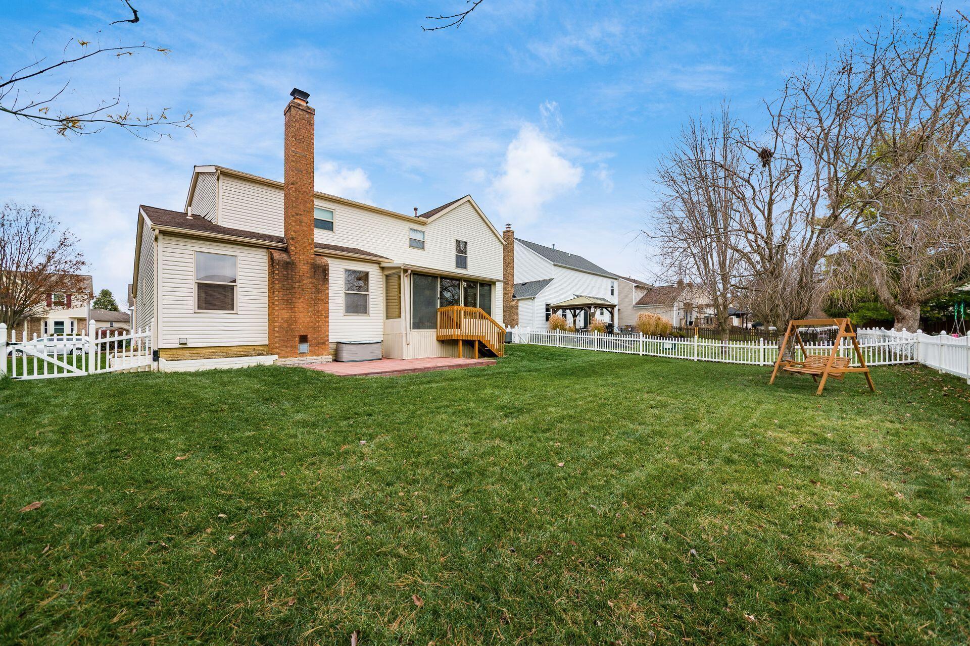 5581 Seapine Road Hilliard, OH 43026 - Photo 53 of 58 Rear View of Home, Fenced Yard, Patio