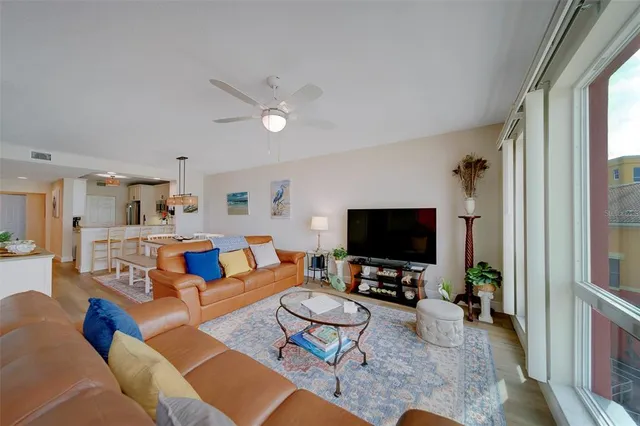 a large white bed in a white room