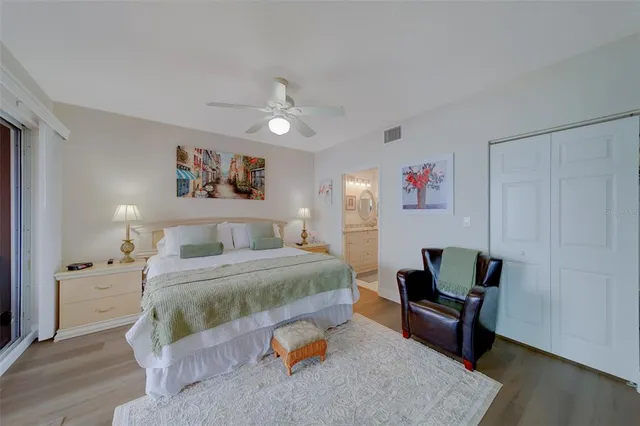 a bathroom with a granite countertop sink mirror and vanity