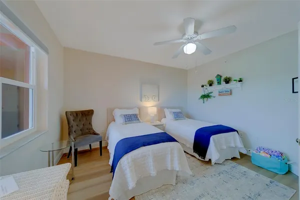 a bedroom with a bed and furniture