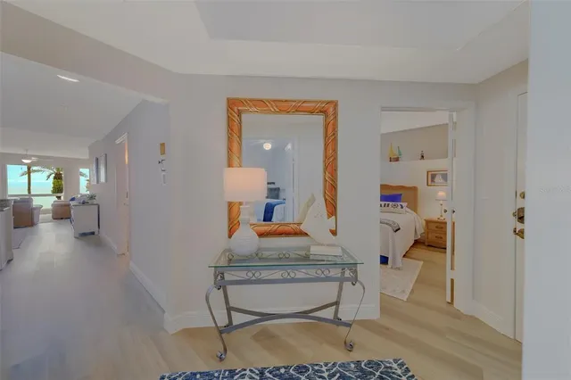 a kitchen with sink cabinets and wooden floor