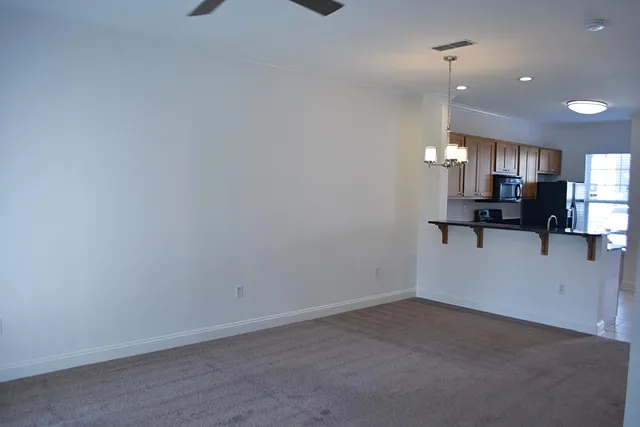 a view of kitchen and livingroom
