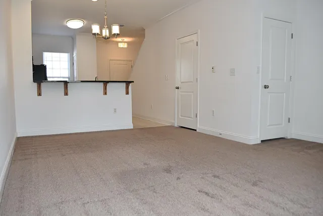 an empty room with a bathroom