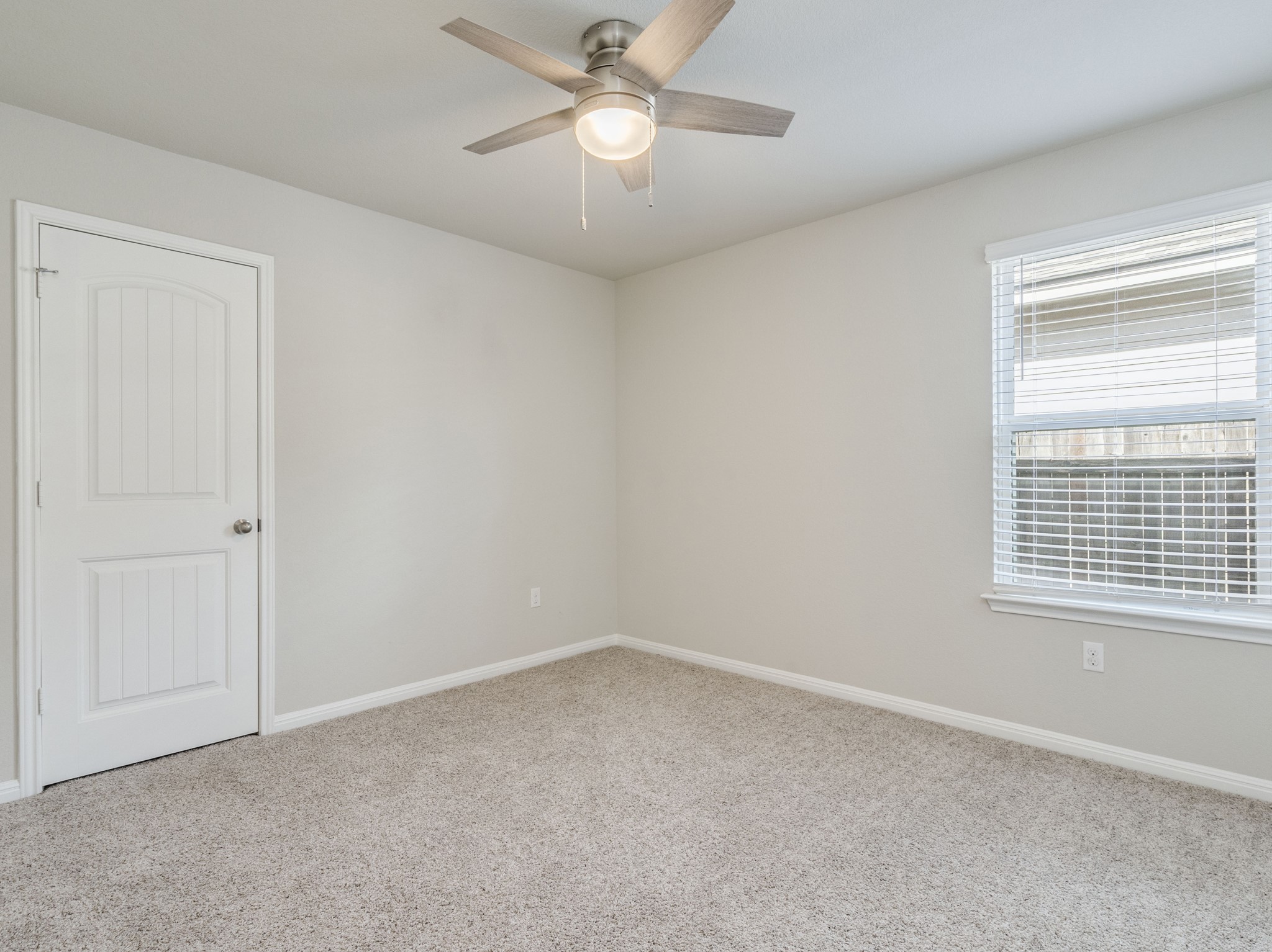 136 Dunlin Lane Leander, TX 78641 - Photo 17 of 24 Unfurnished room featuring carpet floors and a ceiling fan