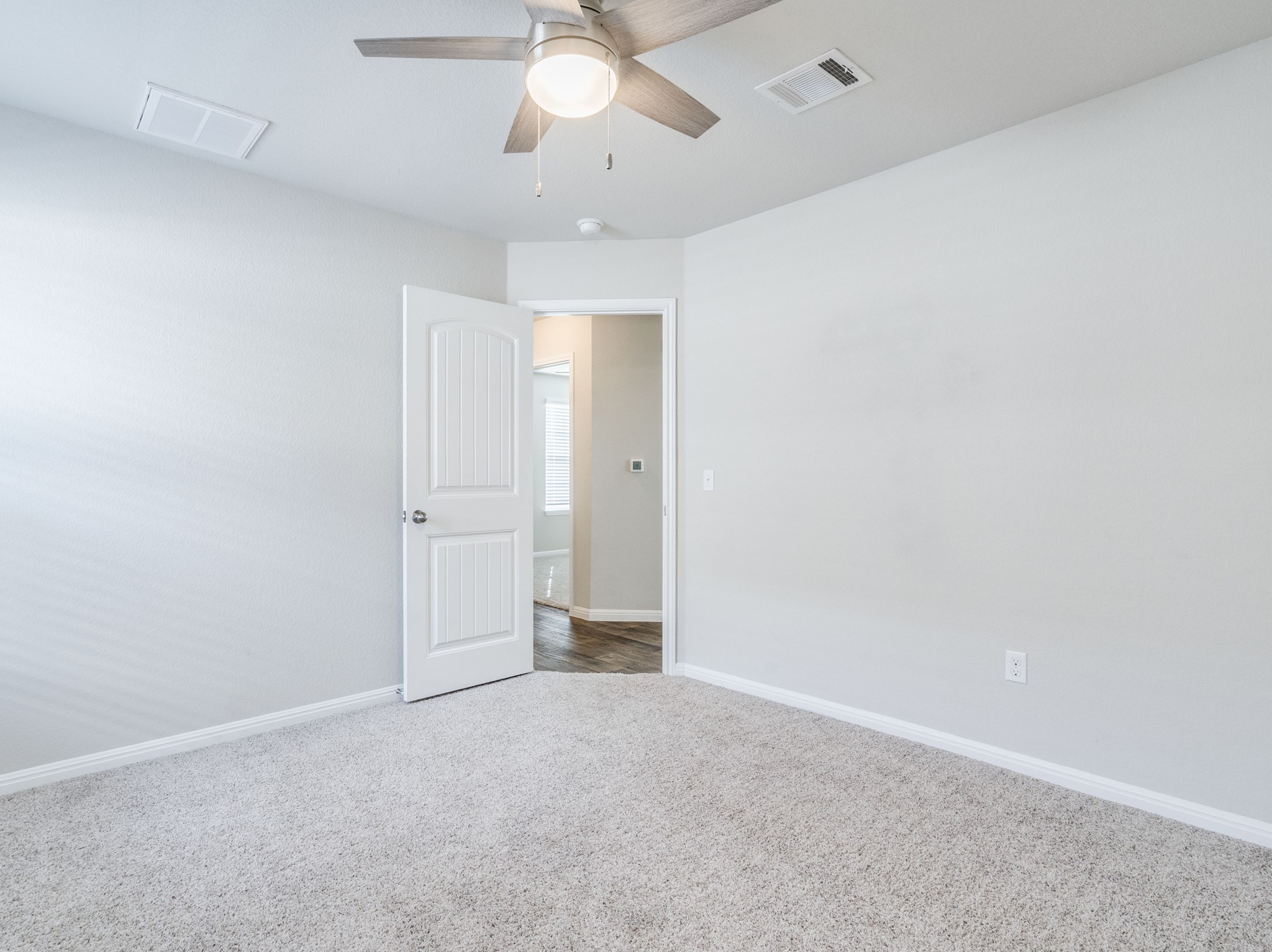 136 Dunlin Lane Leander, TX 78641 - Photo 18 of 24 Carpeted spare room with a ceiling fan and baseboards
