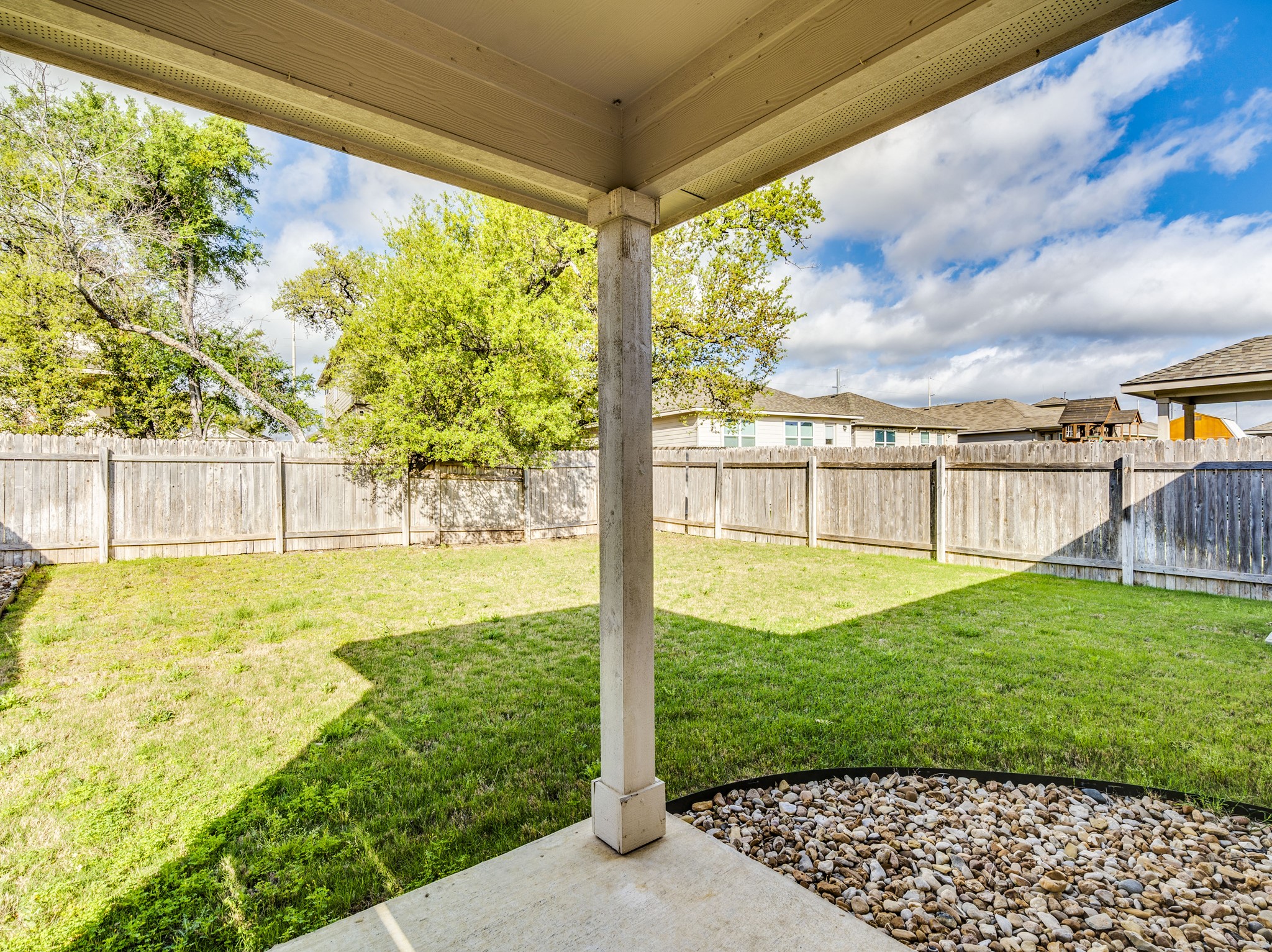136 Dunlin Lane Leander, TX 78641 - Photo 22 of 24 Fenced backyard with a patio