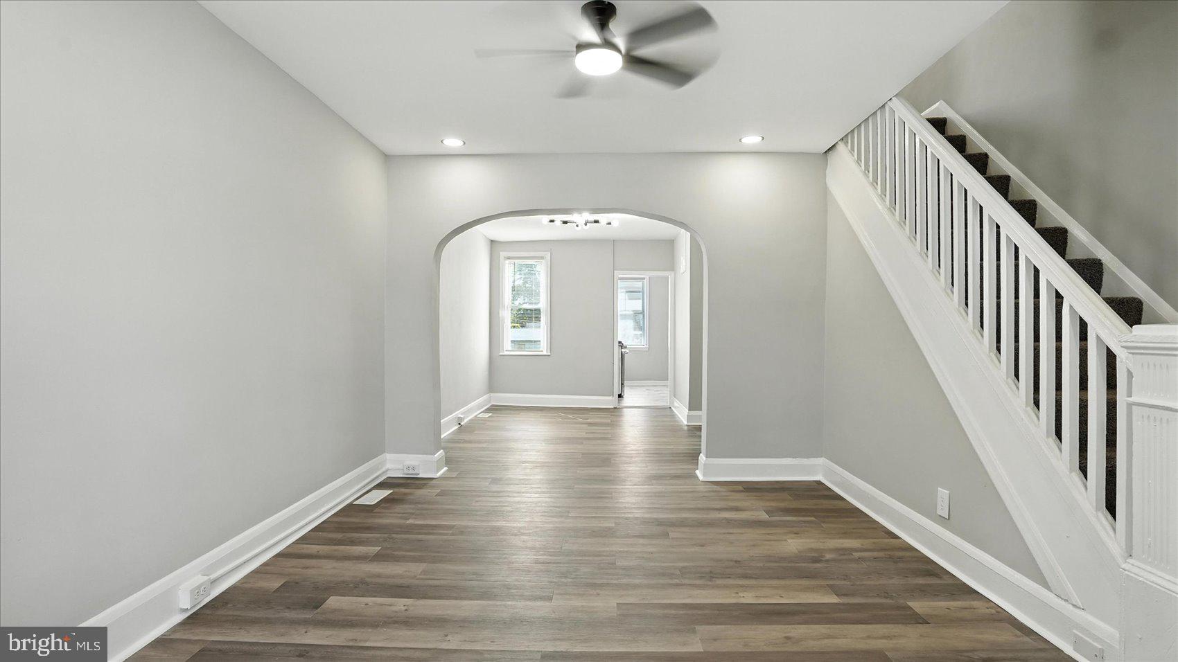 111 Eastern Boulevard Essex, MD 21221 - Photo 2 of 33 wooden floor in an empty room with wooden floor