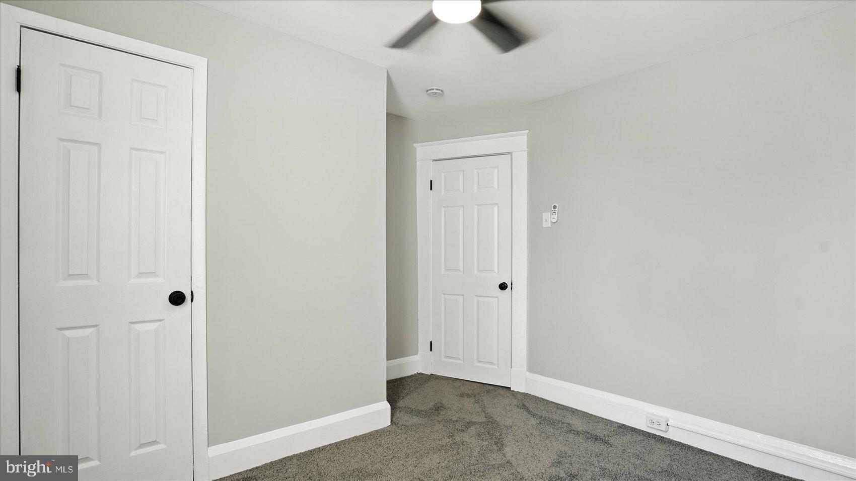 111 Eastern Boulevard Essex, MD 21221 - Photo 21 of 33 an empty room with a empty space and a ceiling fan