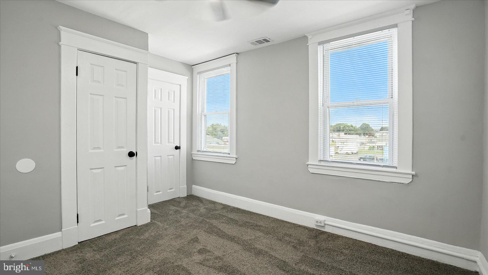 111 Eastern Boulevard Essex, MD 21221 - Photo 22 of 33 a view of an empty room with window and closet area