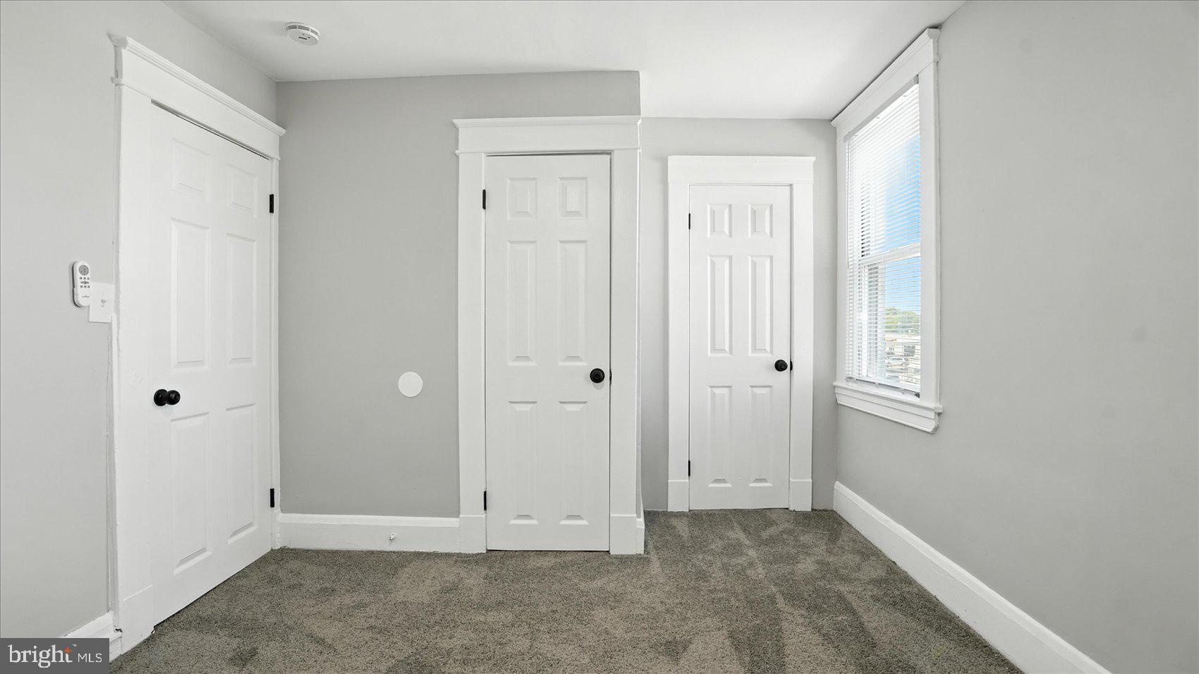 111 Eastern Boulevard Essex, MD 21221 - Photo 23 of 33 an empty room with windows