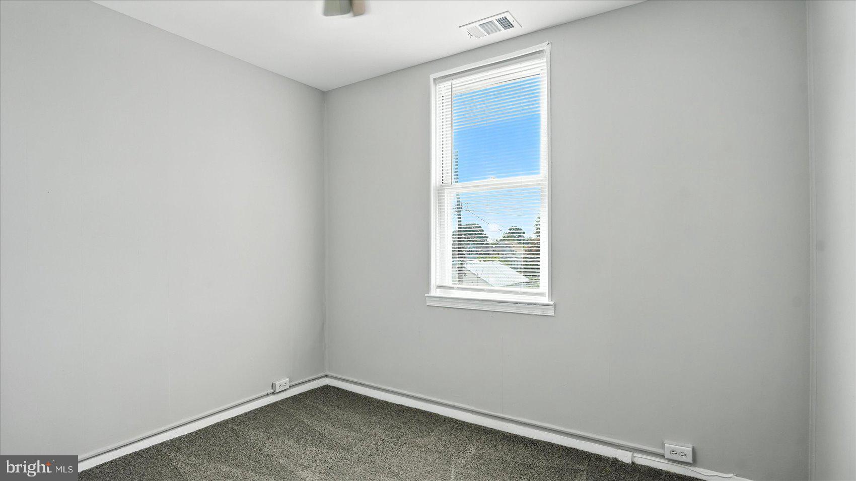 111 Eastern Boulevard Essex, MD 21221 - Photo 28 of 33 an empty room with a window