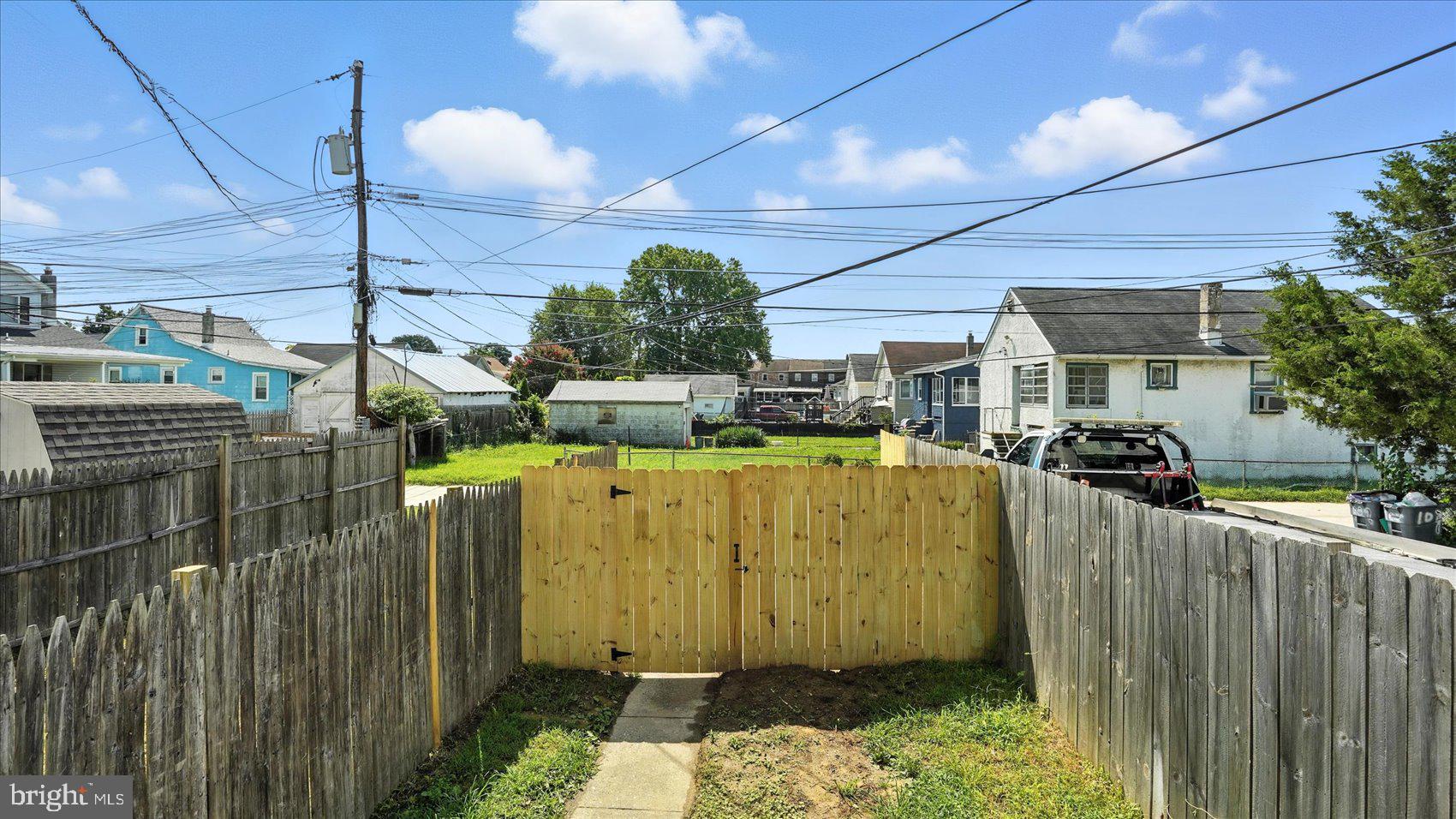 111 Eastern Boulevard Essex, MD 21221 - Photo 30 of 33 a view of a house with a wooden fence