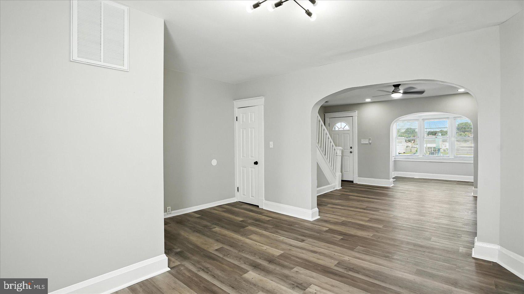 111 Eastern Boulevard Essex, MD 21221 - Photo 9 of 33 a view of a livingroom with wooden floor