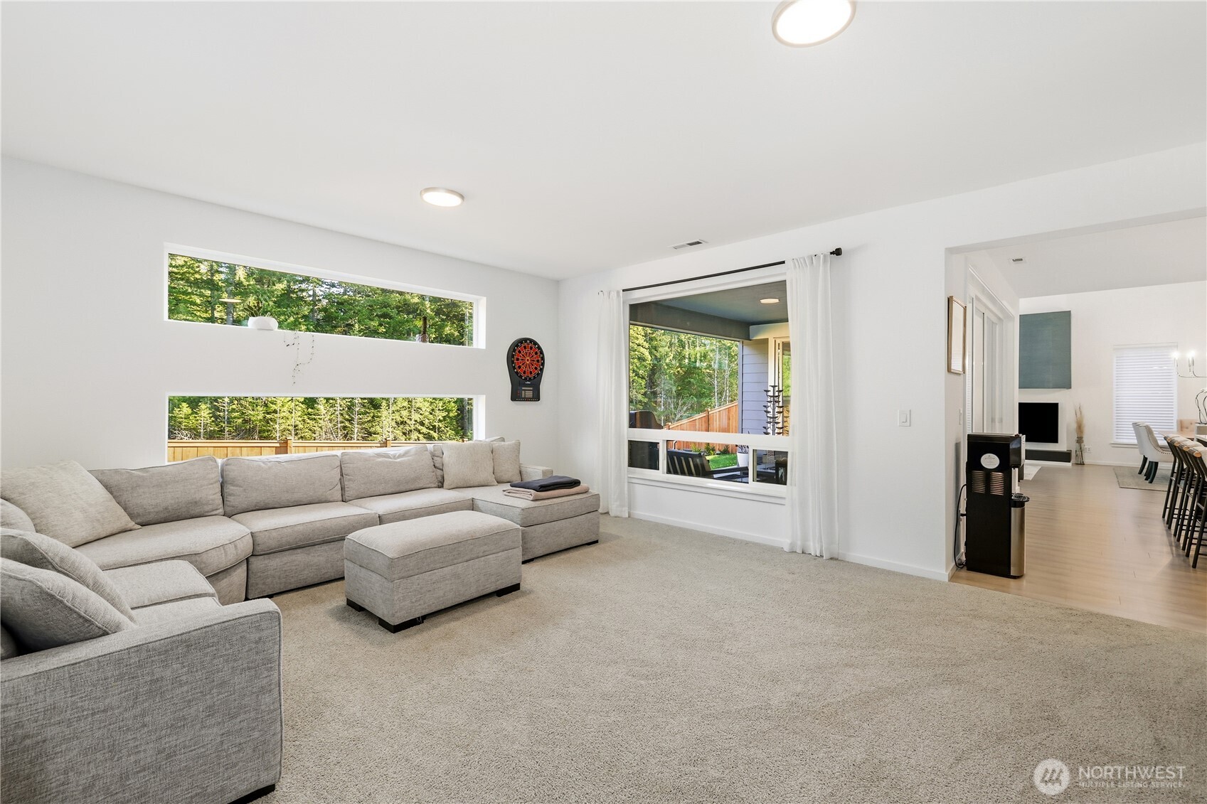 5661 Great Gln Road Southwest Port Orchard, WA 98367 - Photo 12 of 40 a living room with furniture and a large window