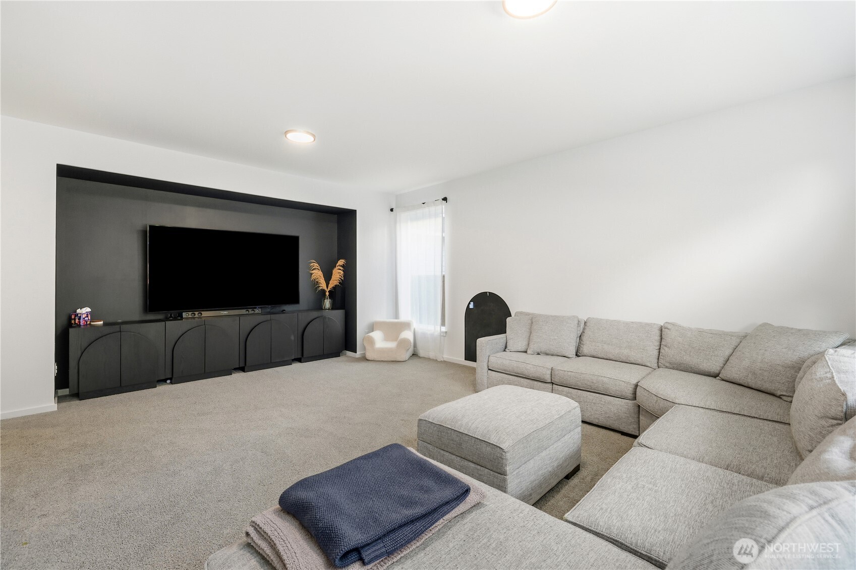 5661 Great Gln Road Southwest Port Orchard, WA 98367 - Photo 13 of 40 a living room with furniture and a flat screen tv