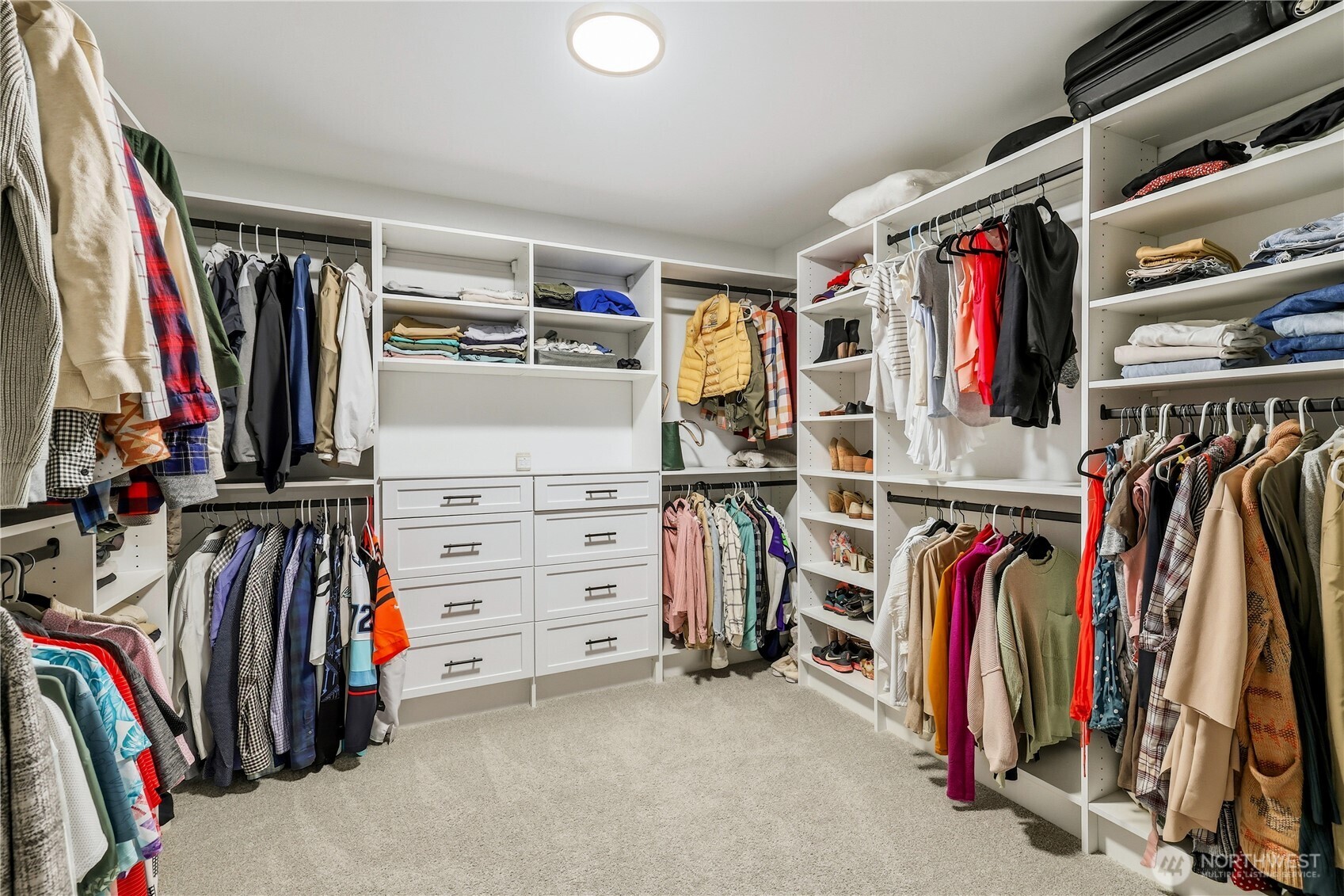 5661 Great Gln Road Southwest Port Orchard, WA 98367 - Photo 21 of 40 a view of walk in closet with clothes