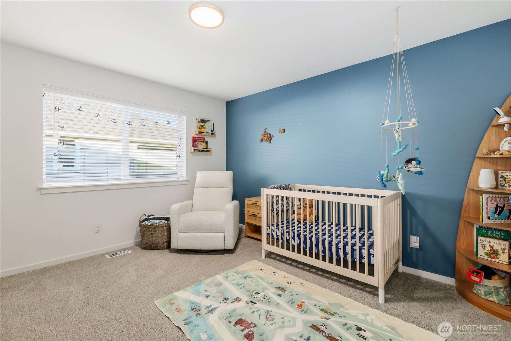 5661 Great Gln Road Southwest Port Orchard, WA 98367 - Photo 23 of 40 a bedroom with furniture and a window