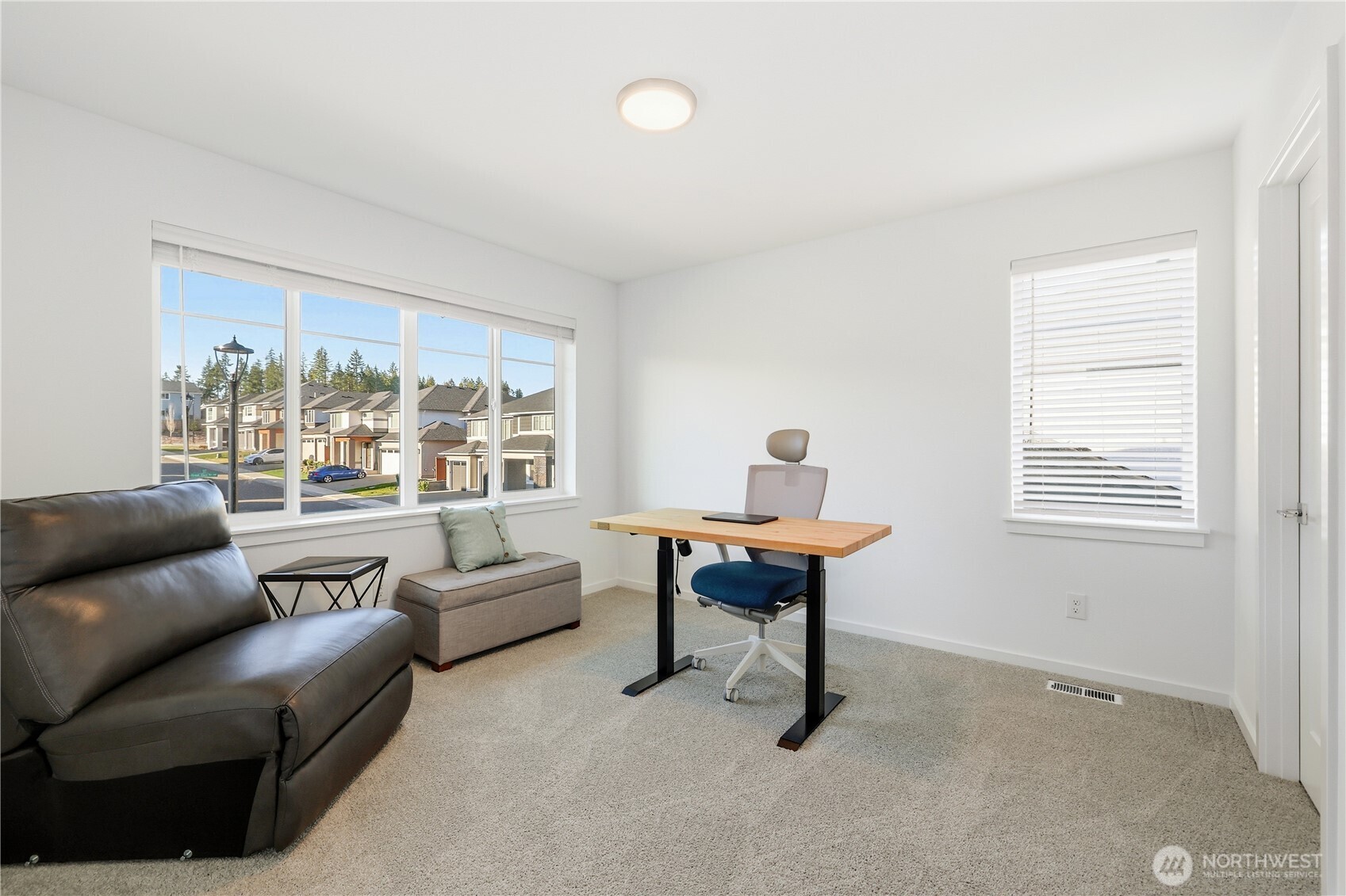 5661 Great Gln Road Southwest Port Orchard, WA 98367 - Photo 25 of 40 a living room with furniture and a window