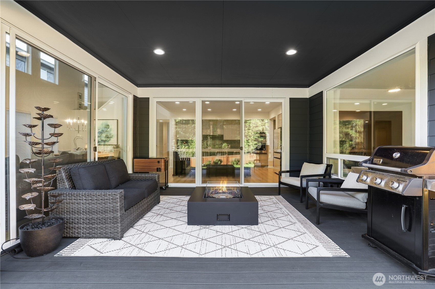 5661 Great Gln Road Southwest Port Orchard, WA 98367 - Photo 29 of 40 a living room with furniture and a rug