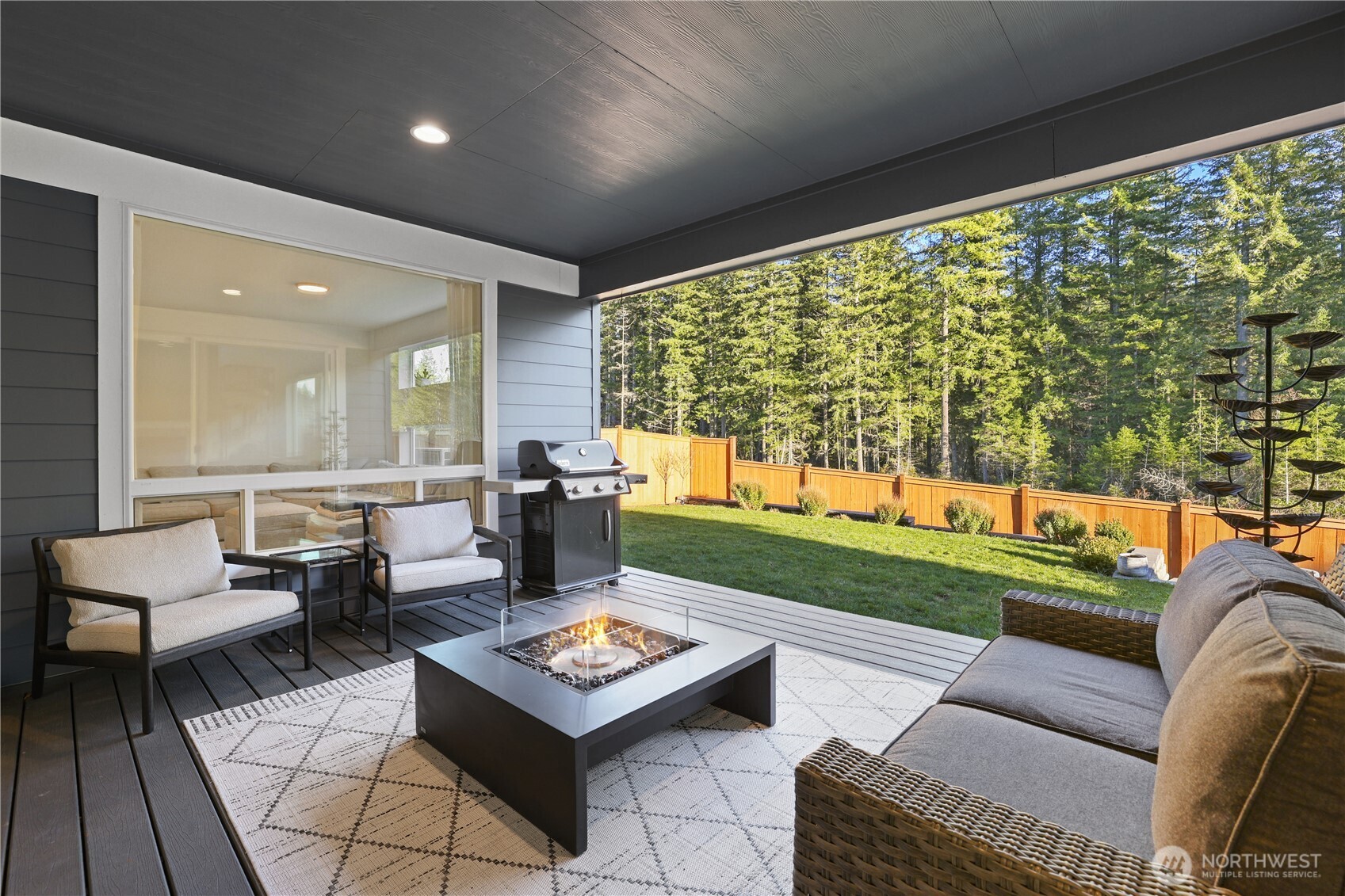 5661 Great Gln Road Southwest Port Orchard, WA 98367 - Photo 30 of 40 a living room with furniture and a large window