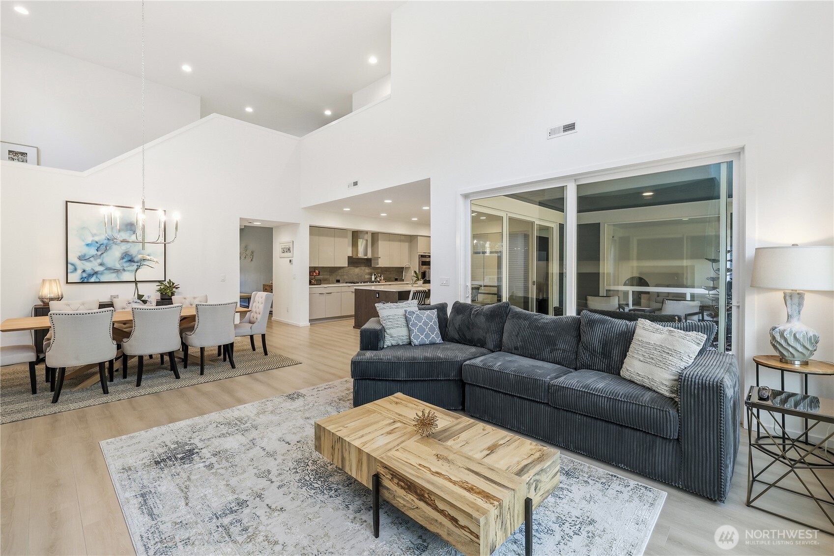 5661 Great Gln Road Southwest Port Orchard, WA 98367 - Photo 6 of 40 a living room with furniture wooden floor and a table