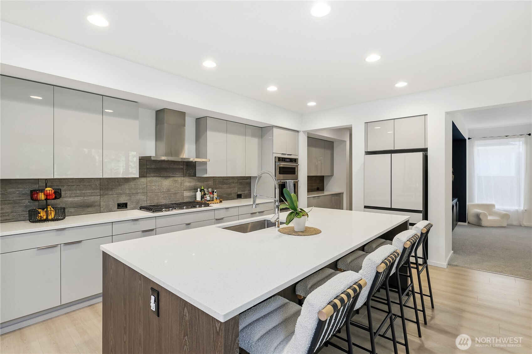 5661 Great Gln Road Southwest Port Orchard, WA 98367 - Photo 9 of 40 a kitchen with a stove a refrigerator and a sink