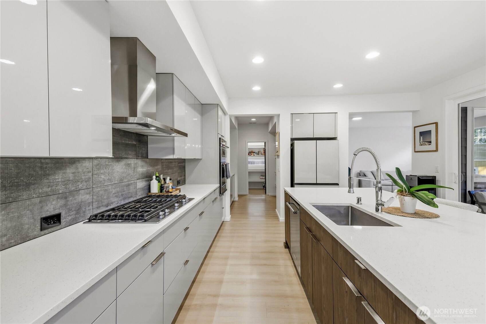 5661 Great Gln Road Southwest Port Orchard, WA 98367 - Photo 10 of 40 a kitchen with stainless steel appliances a sink stove and cabinets