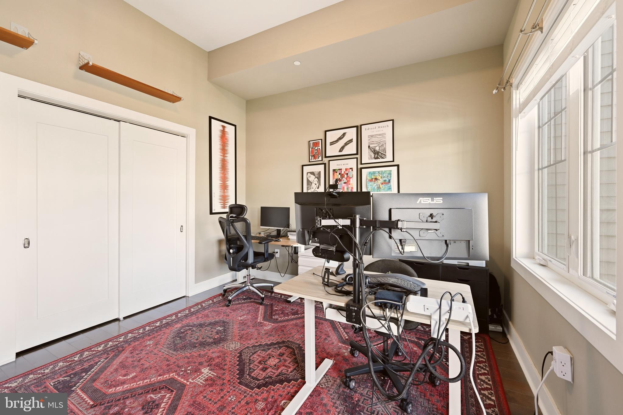 630 14th Street Northeast, Unit 5 Washington, DC 20002 - Photo 17 of 24 a view of a workspace with furniture and a window