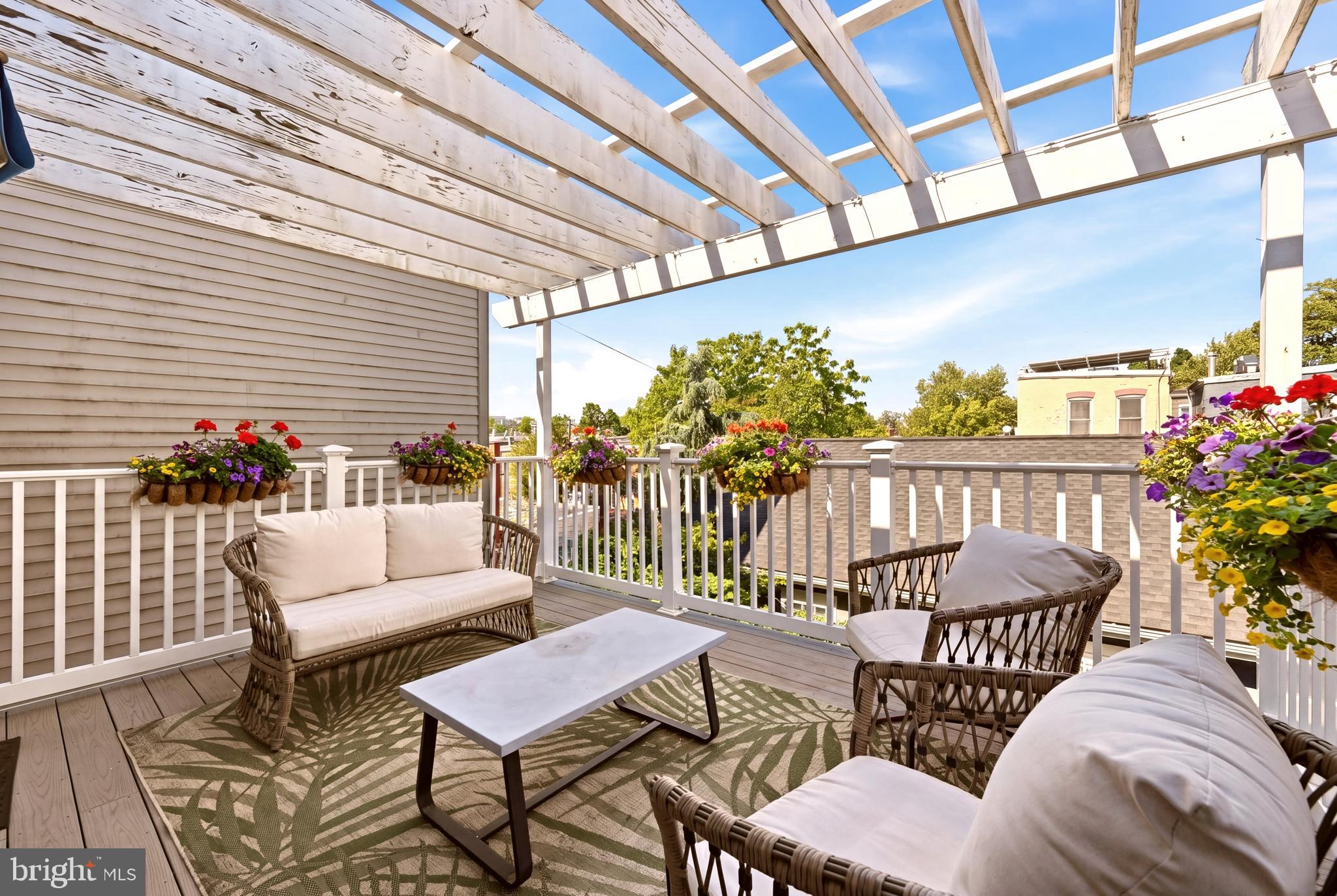 630 14th Street Northeast, Unit 5 Washington, DC 20002 - Photo 20 of 24 a view of a chairs and table in the patio