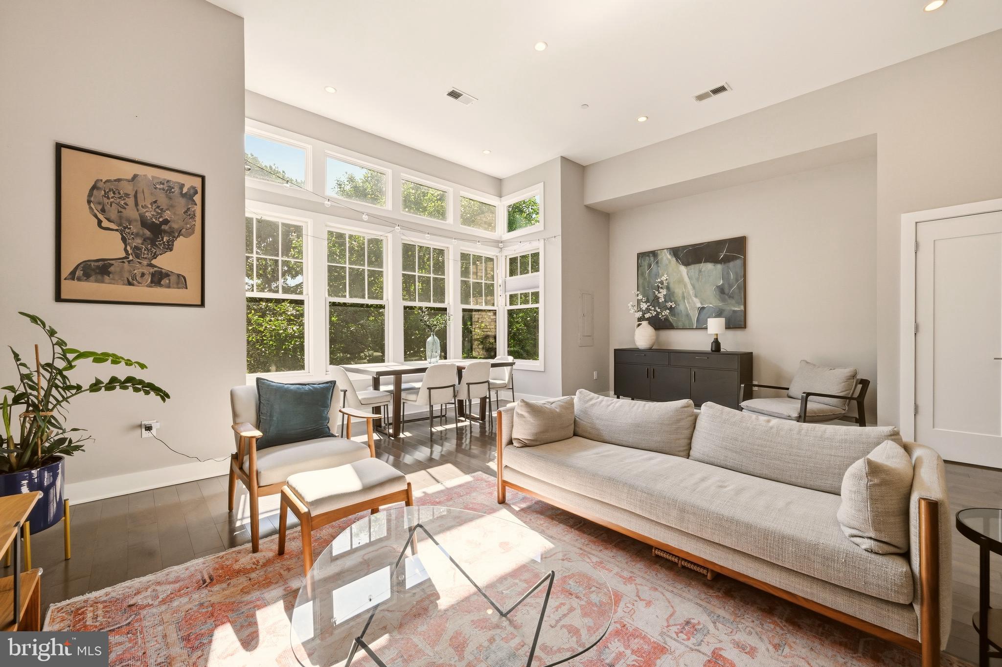 630 14th Street Northeast, Unit 5 Washington, DC 20002 - Photo 2 of 24 a living room with furniture and a large window