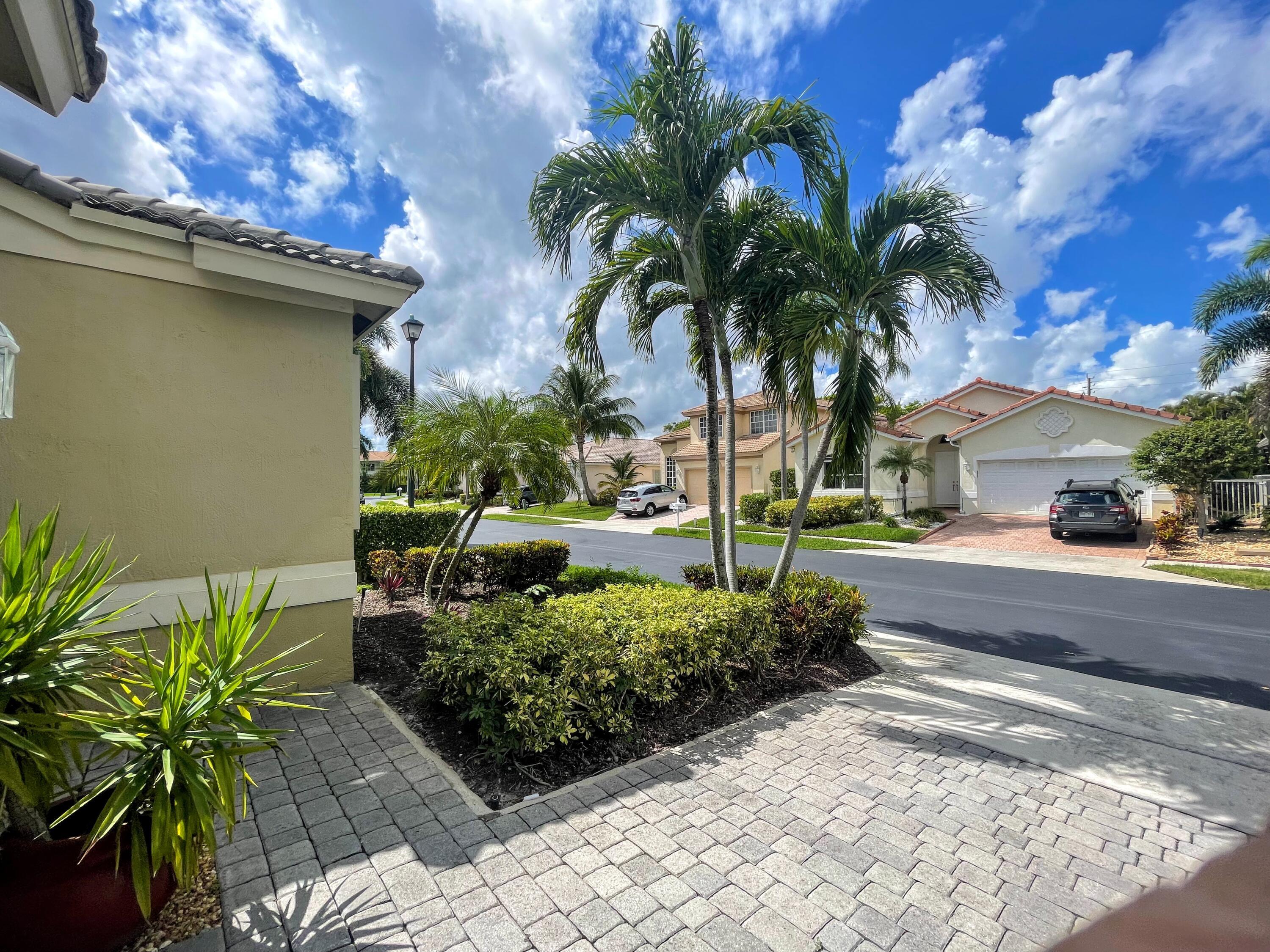 7060 Northwest Turtle Walk Boca Raton, FL 33487 - Photo 5 of 51 FRONT EXTERIOR