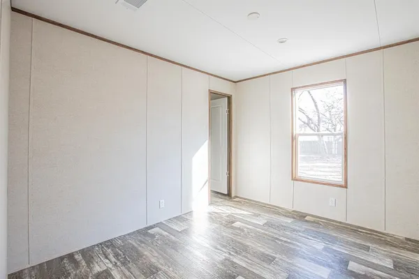 a bathroom with a granite countertop sink a toilet and a bathtub