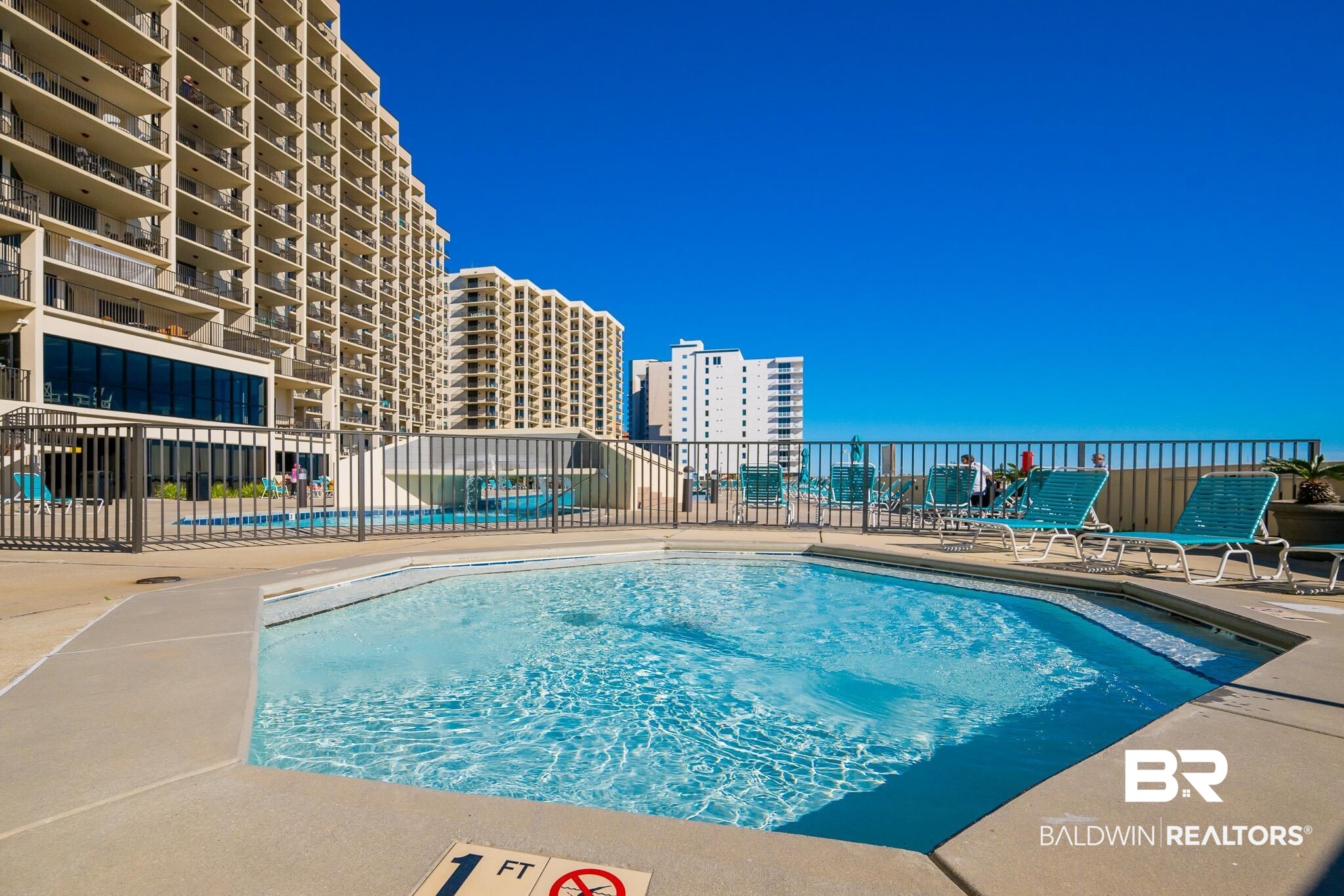 26802 Perdido Beach Boulevard, Unit 406 Orange Beach, AL 36561 - Photo 31 of 37 View of community pool