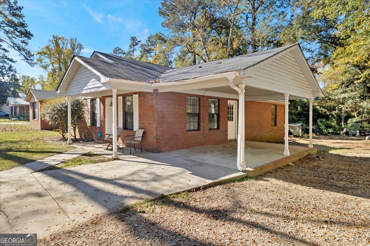 201 Culpepper Street Thomasville, GA 31792 - Photo 20 of 32 a view of a house with a patio