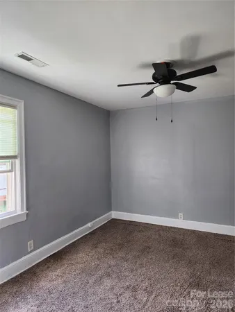 a view of a room with an empty space