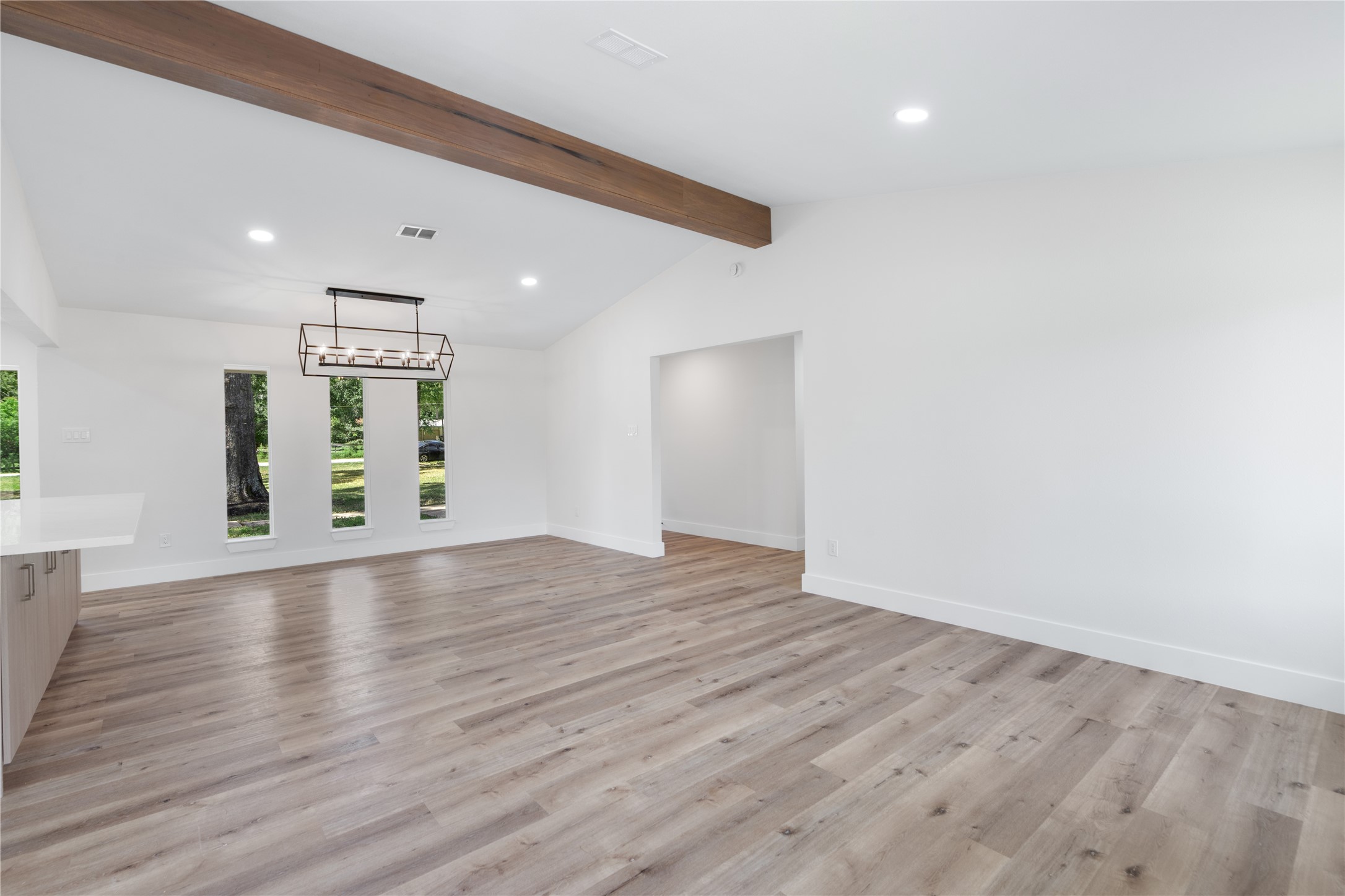 12019 Beth Lane Magnolia, TX 77354 - Photo 12 of 49 a view of an empty room with wooden floor